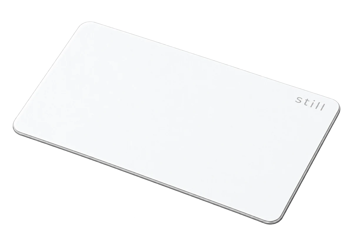 White Still Card product rendering showing its slim 1.8 mm profile